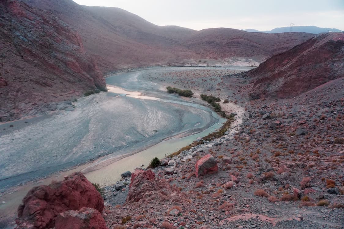 The Ziz River winding through a dry mountain valley