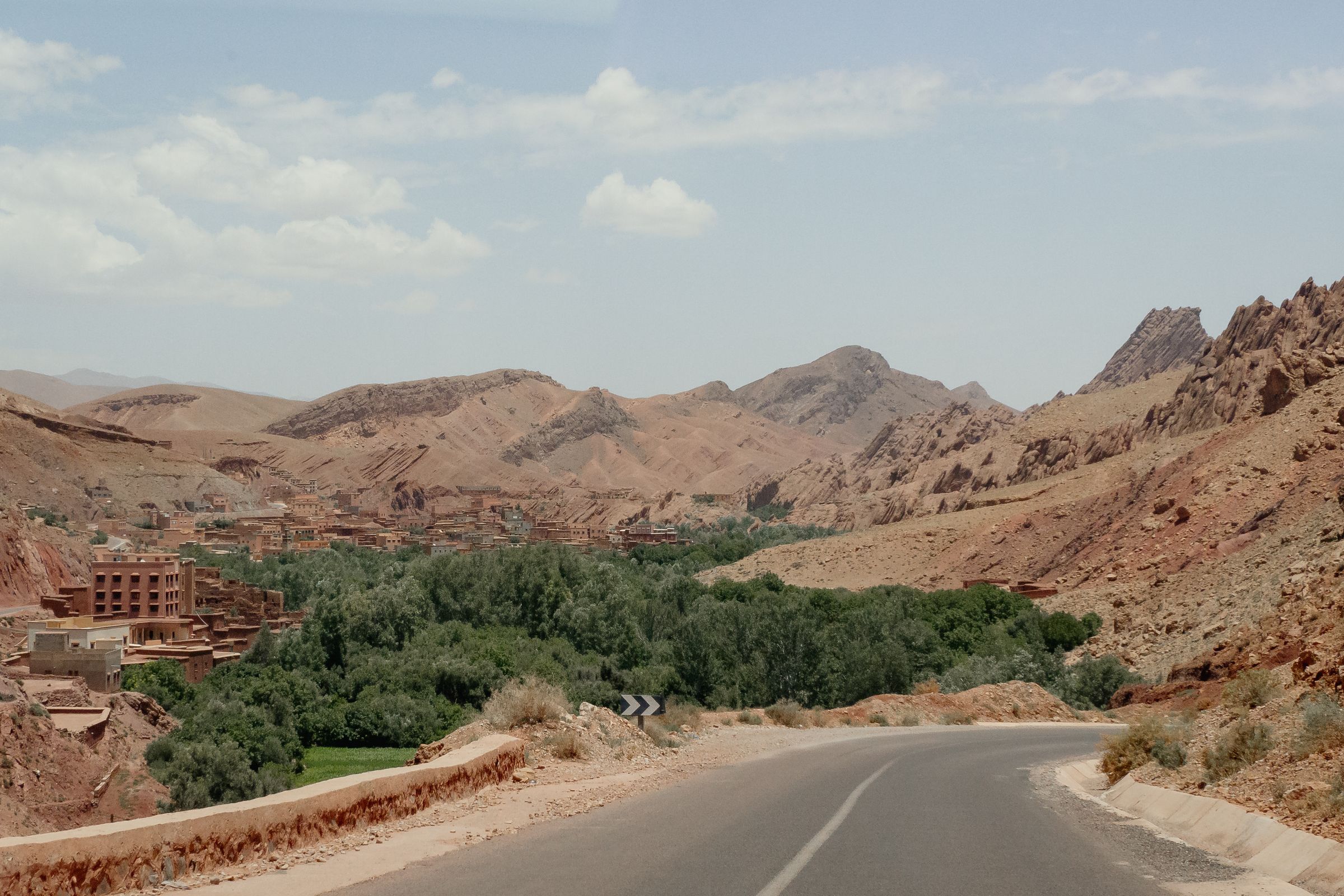 Desert valley road winding through southern Morocco